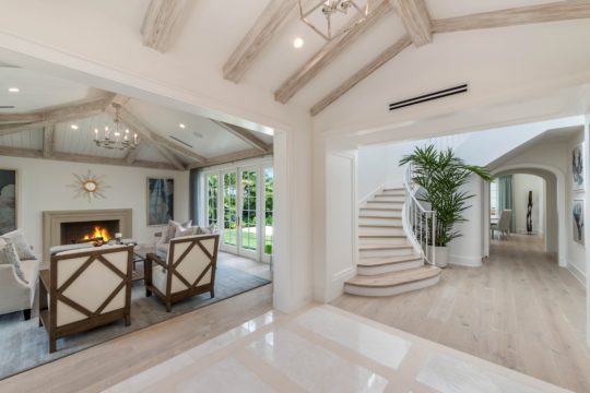 Arabian living room and staircase by Ecclestone Homes