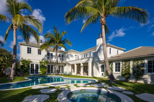 Backyard pool and exterior of Palmo by Ecclestone homes