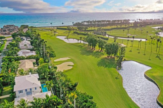 aerial image of golf course and ocean