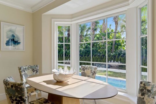 breakfast nook with view of the lap pool by llwyd ecclestone
