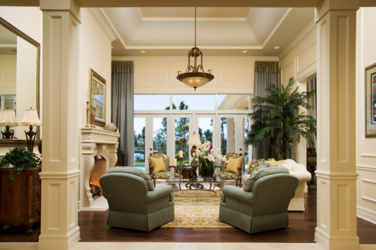Medalist living room with large furniture before ecclestone