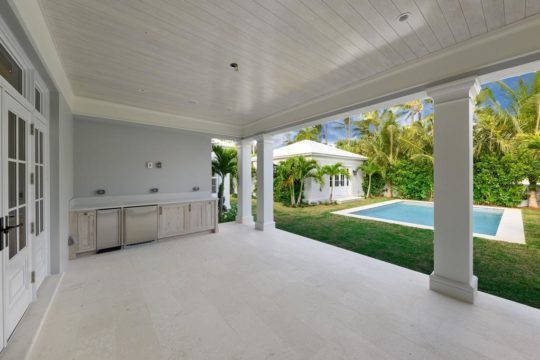 outdoor kitchen and pool by llwyd ecclestone